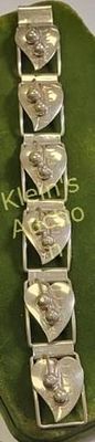 vtg sterling taxco leaf & berry bracelet 7 1/2". from estate signed on back 7 1/2" long18.7mm 