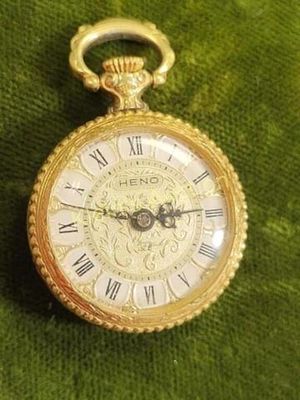 vtg heno 17 jewel pocket watch wind up works. pocket pendant watch 23.8mm wide very clean 