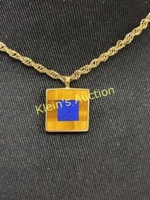 14K yellow gold pendant & gold filled necklace. looks like lapis on one side and obsidian on the 