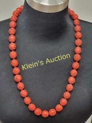 Chinese carved red cinnabar necklace. 28" long 15.5 mm balls and hand knotted seepics