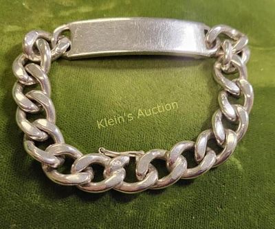 sterling silver curb link bracelet 7 1/2" heavy. 7 1/2" long double signed on chain and bracelet 