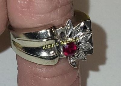 14K white gold ruby & diamond cocktail ring. 14k white gold ring with ctr ruby center stone 