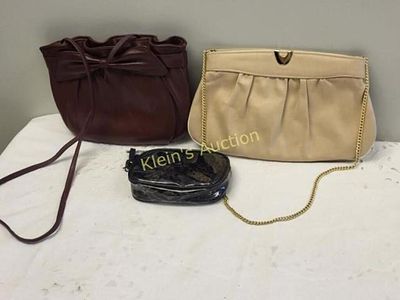 estate purses lot of 3 ande burgundy, beige clutch. nice cosmetic bag all are nice and clean 