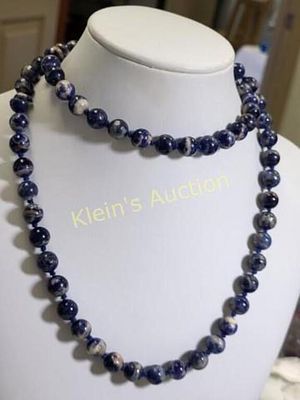 sodalite necklace 28" & 281 carats vintage beauty. 8.5 mm wide each great colors did notice 1 