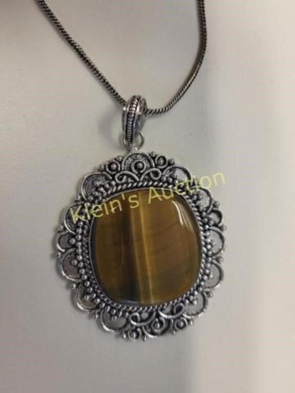 tiger eye pendant w/18" chain german silver. very pretty with original tag see pics tiger eye 