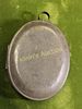 Antique oval Tin locket Victorian hand painted. 2 1/2" by 2" when opens has pictures of girls Image - 2
