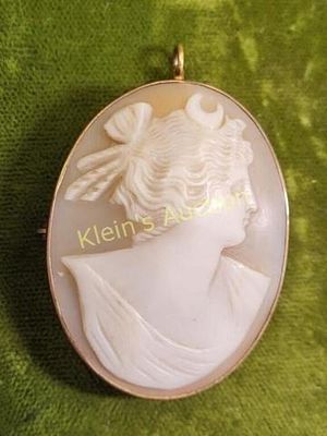 rose gold 14K antique carved cameo brooch pendant. has rose gold cap and yellow gold frame 