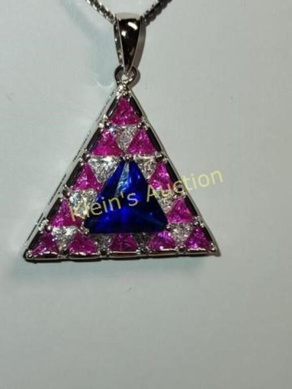 sterling silver tanzanite color w/pink ice necklace
18" sterling chain & sterling pendant with 