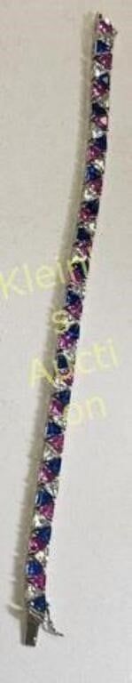 sterling silver tennis bracelet trillion cut stone. from estate 7" all trillion cut stones looks 