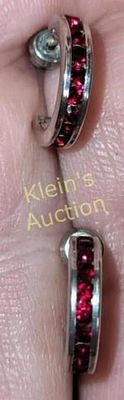 sterling silver w/ ruby color stone huggies earrig. sterling silver w/ ruby color stone huggies 