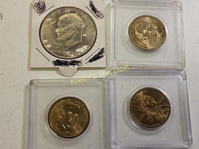4 vtg dollar coins 72 ike, and gold dollars. 1972 Eisenhower dollar au, James madsion $1 and 