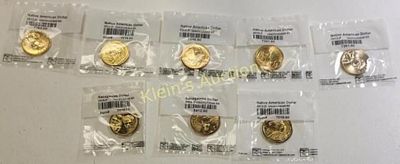 8 us coins $1 gold tone native american & sacagawe. all graded from Littleton coin 2005 D to 