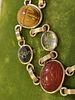 gold filled gemstone scarab Bracelet 7 3/4. all hand carved gemstone with safety chain marked Image - 1