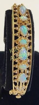 14K custom Victorian opal & pearl hinged bracelet. all prong set opals set in 14K yellow gold 