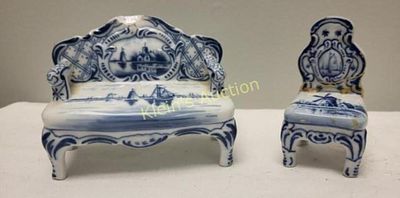 delft blue & white ceramic miniature sofa & chair. they are crafted from ceramic or porcelain 