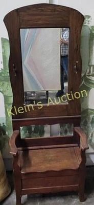 1900's Victorian oak hall tree w/storage & mirror. crafted from oak with hooks on either side 