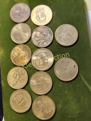 lot of 12 gold tone us dollar coins Sacajawea too. presidential dollars too all 12 forone bid 