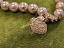 silver Beaded Oriental Bracelet. not magnetic see pics also has a charmImage - 2
