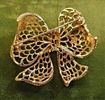 Napier vintage gold tone bow brooch. 2" wide and very pretty signed on back seepicsImage - 2