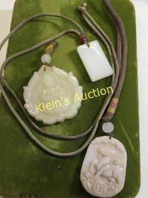 lot of 3 carved pendants Jade?. 1 is made to carry other goes on your neck 26" w/slide, and 