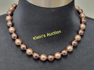 bronze pearls faux necklace w/gold tone clasp. 11.5mm faux pearls 17.5" long with gold tone 