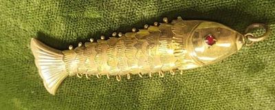 14K solid gold articulated fish pendant ruby eyes. gorgeous estate pendant 14K yellow gold not 