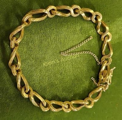 18K yellow gold curb link bracelet 8". substantial 6.5mm wide 32.5 grams weight 8" long will 