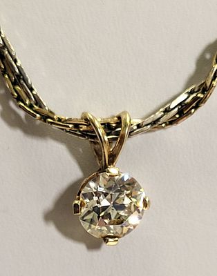 estate necklace w/14K pendant 2 1/2 carat diamond culet. tested diamond on our electronic tester 