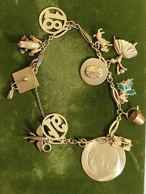 vtg 14K solid gold charm bracelet dancer, 16, 18++. lots of great charms or take charms off and 