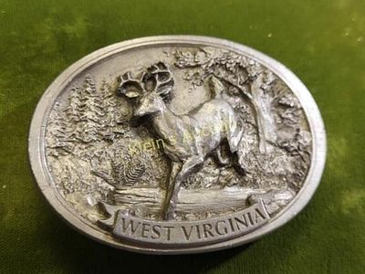solid pewter w va deer belt buckle. limited edition 1986 in great shape ready to put your belt 