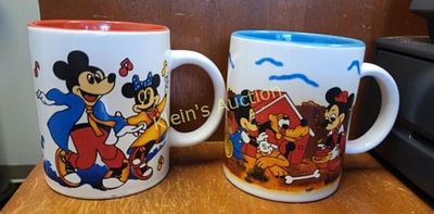 vtg Disney ceramic coffee mugs lot of 2. these are from the 1990 mickeys through out the years 