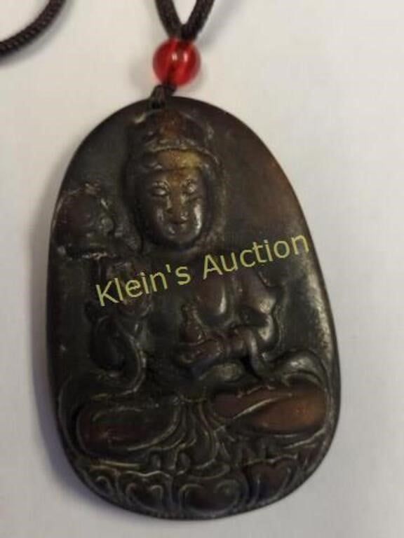 Lot 5453 – jade? or carved stone pendant  Guanyin necklace