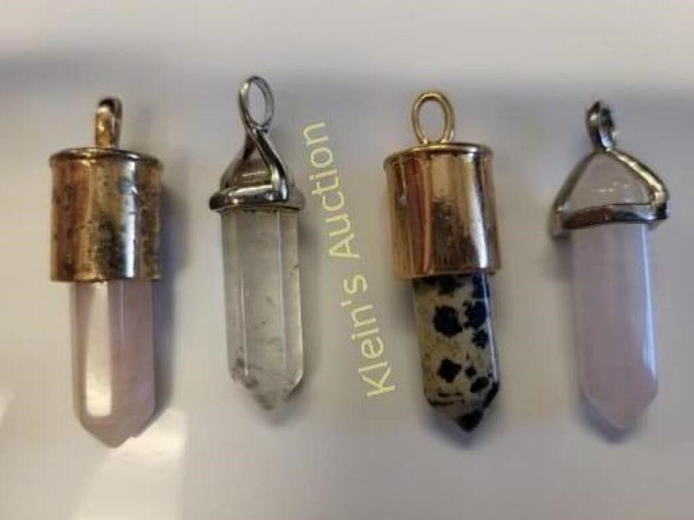 Lot 5515 – four hexagonal crystal point pendants