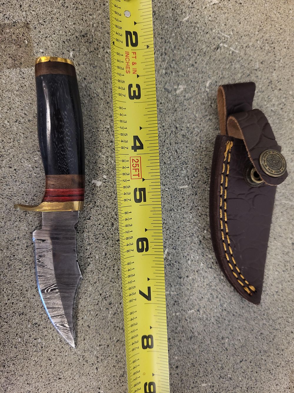 Lot 6373 – Damascus steel hunting knife w/brass guard & sheat