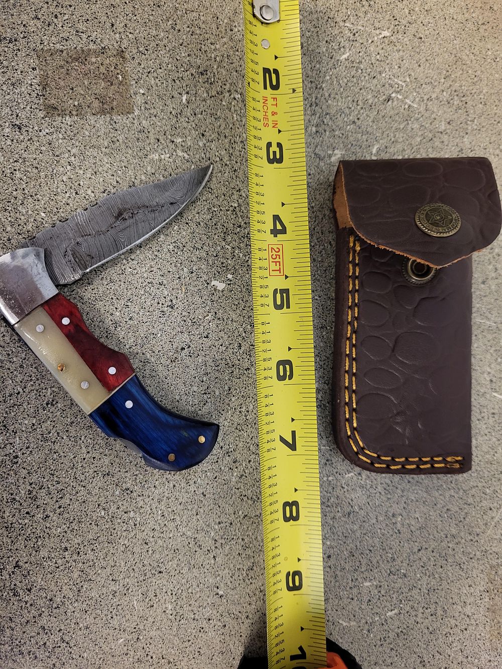 Lot 6374 – folding pocket knife Damascus style blade w/sheath
