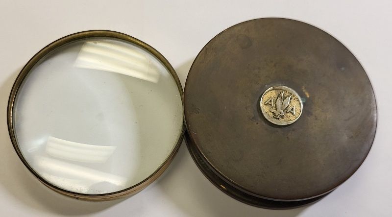 Lot 6337 – 1960’s American airlines Bronze Magnifying glass