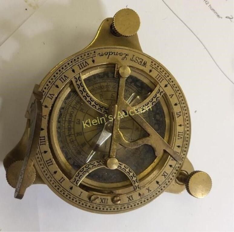 Lot 6511 – vtg brass sundial compass works