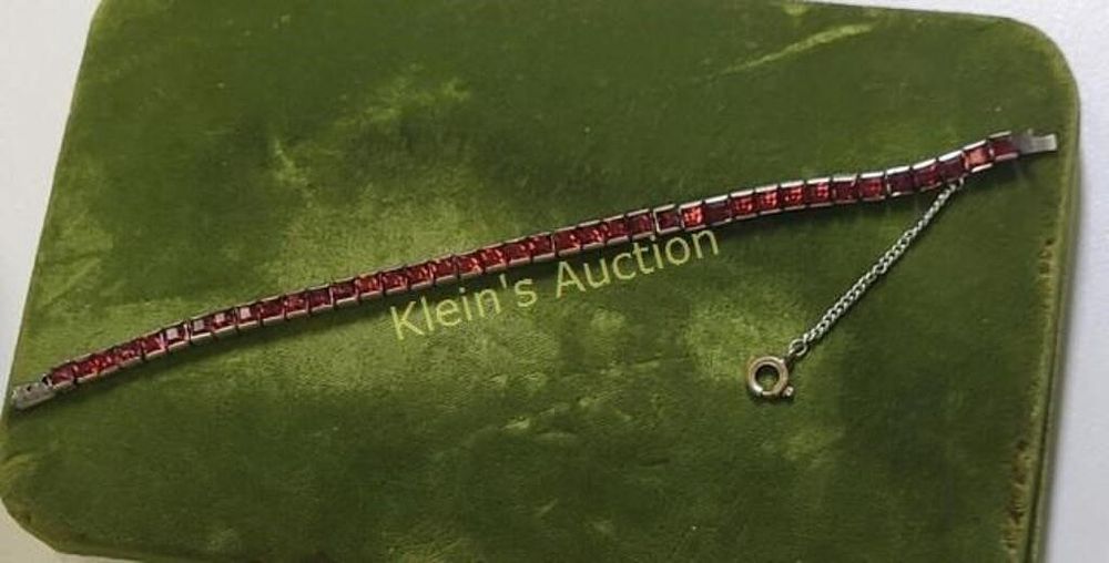 Lot 6406 – ciner? ruby color crystal tennis bracelet
