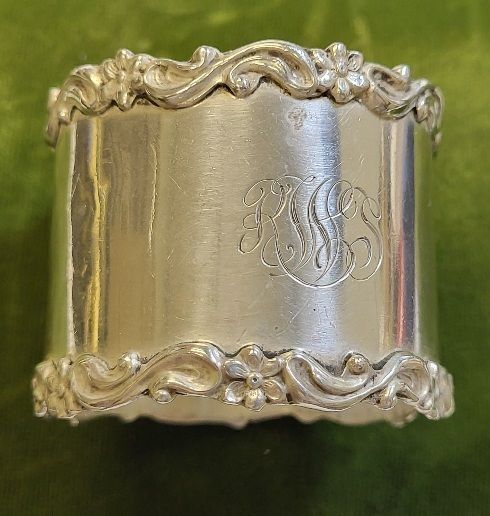 Lot 6734 – sterling repousse napkin ring NS CO