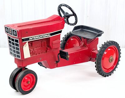 Ertl International Narrow Front Pedal Tractor. Ertl International narrow front pedal tractor. 