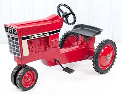 Ertl International Narrow Front Pedal Tractor. Ertl International narrow front pedal tractor. 