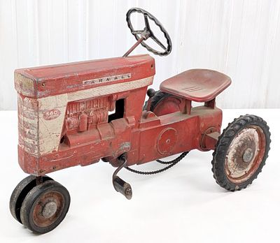 Eska Farmall 560 Narrow Front Pedal Tractor. Eska Farmall 560 narrow front pedal tractor. The 