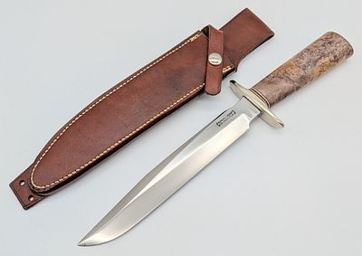 1970's Randall Model 1 8in Thuya Burl All Purpose Fighter w/ Sheath. Features a nickel silver 