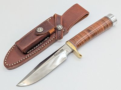Randall Model 5 5in Camp & Trail Knife w/ Sheath. Features thumb notches on the blade, a brass 