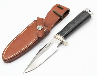 Randall Model 8 Black Micarta Trout & Bird Knife w/ Sheath. Features a stainless steel blade, a 