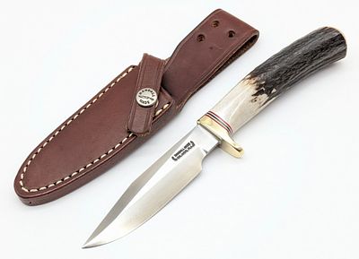 Randall Model 8 Stag Trout & Bird Knife w/ Sheath. Features thumb notches on the spine, a brass 