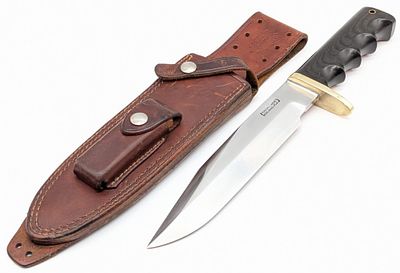 1980's Randall Model 14 Single Guard Attack Knife w/ Sheath. Features a brass oblong single 