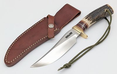 Randall Model 27 Stag Trailblazer w/ Sheath. Features a brass single downturned guard, a stag 