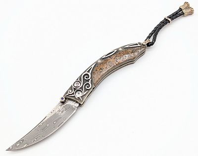 William Henry 1 of 25 Model B1 Folding Knife. This is a gorgeous 1 of 25 knife. Features a rain 