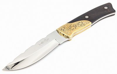 Stephen Mackrill Engraved Brass Drop Point Hunter. Features a mirror polished drop point blade 